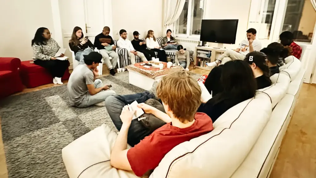 International university students gathered for Christian discipleship and Bible discussion in Budapest Hungary