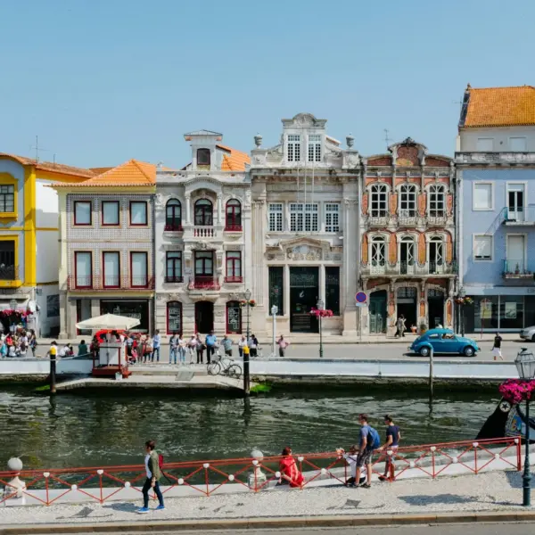 Colorful historic buildings lining a canal in Aveiro, Portugal